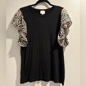 Violet & Claire Black Top with Animal Print Ruffle Sleeves